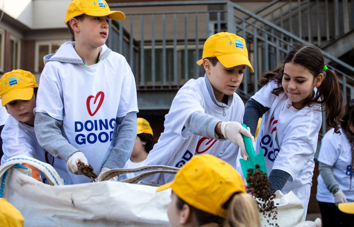 Children beautify a local park in Rome, Italy (Good Deeds Day) Children beautify a local park in Rome, Italy (Good Deeds Day)
