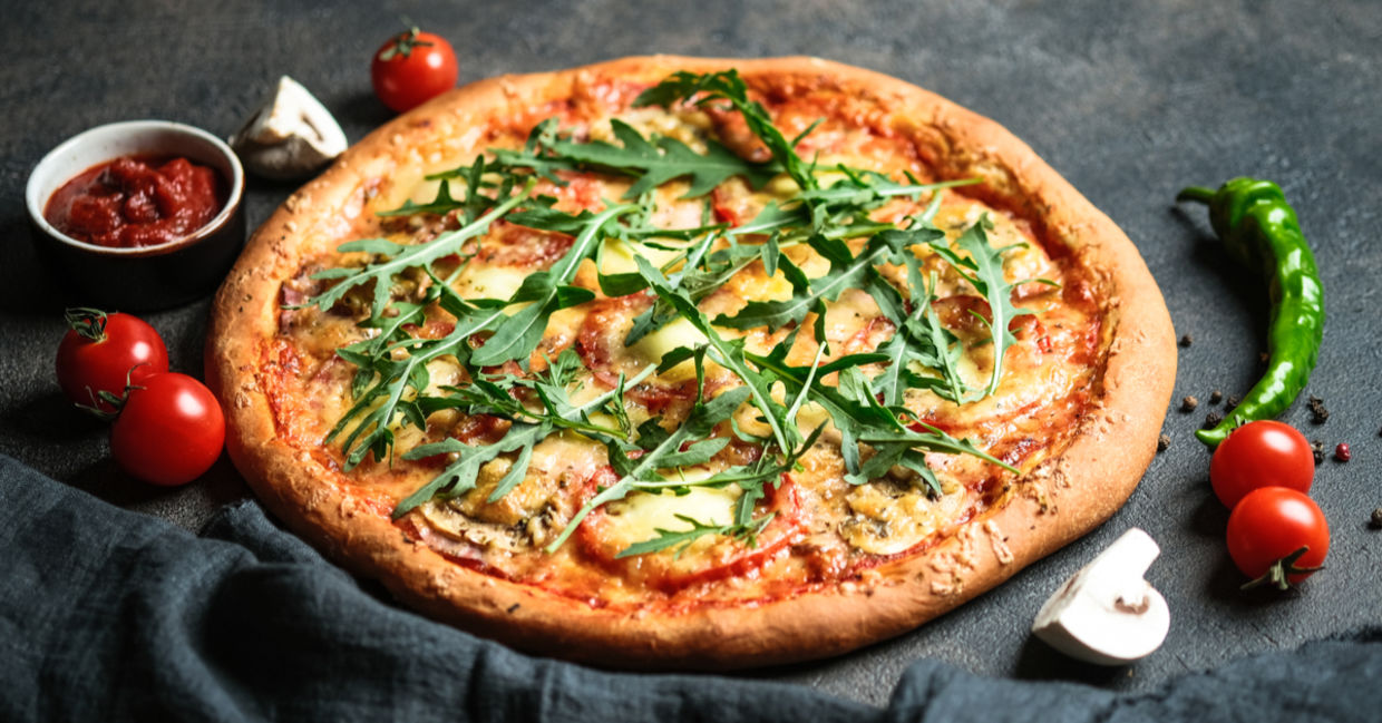 Mushroom and arugula pizza. Mushroom and arugula pizza.