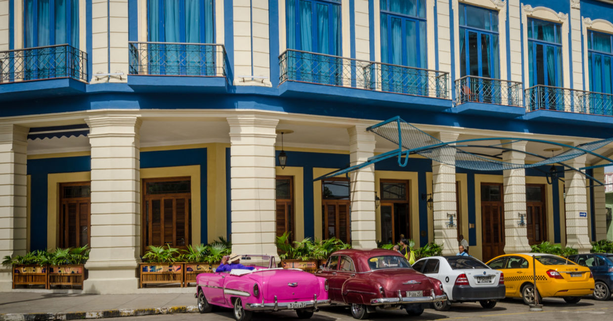 Classic cars are among the taxis waiting for passengers outside of Cuba’s Hotel Telégrafo Classic cars are among the taxis waiting for passengers outside of Cuba’s Hotel Telégrafo