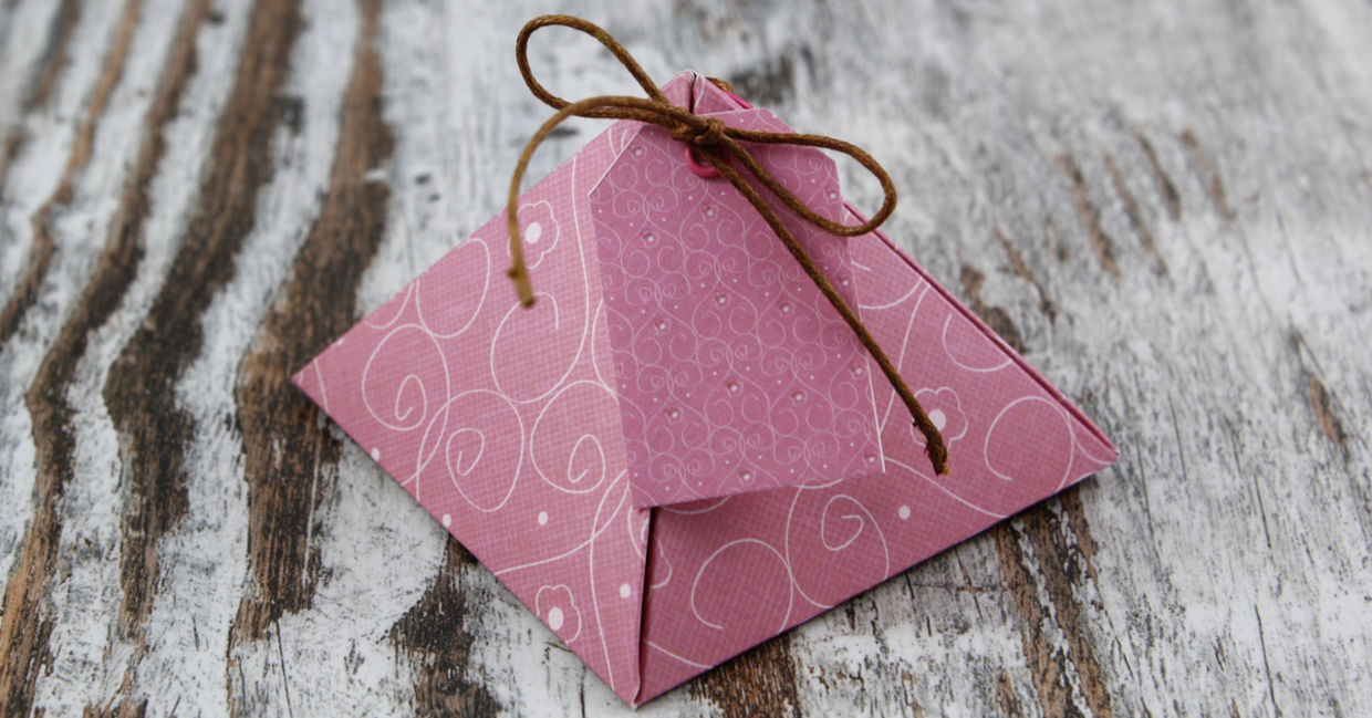 A handmade pyramid gift box tied with twine. A handmade pyramid gift box tied with twine.