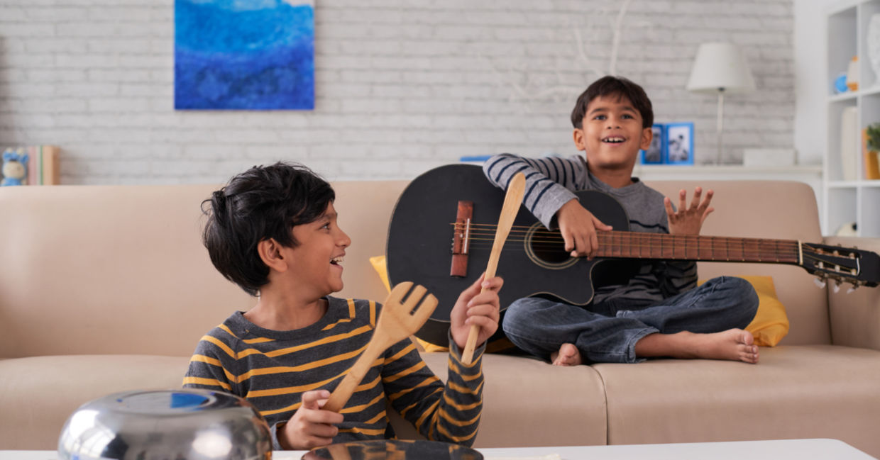 Kids enjoying music at home. Kids enjoying music at home.