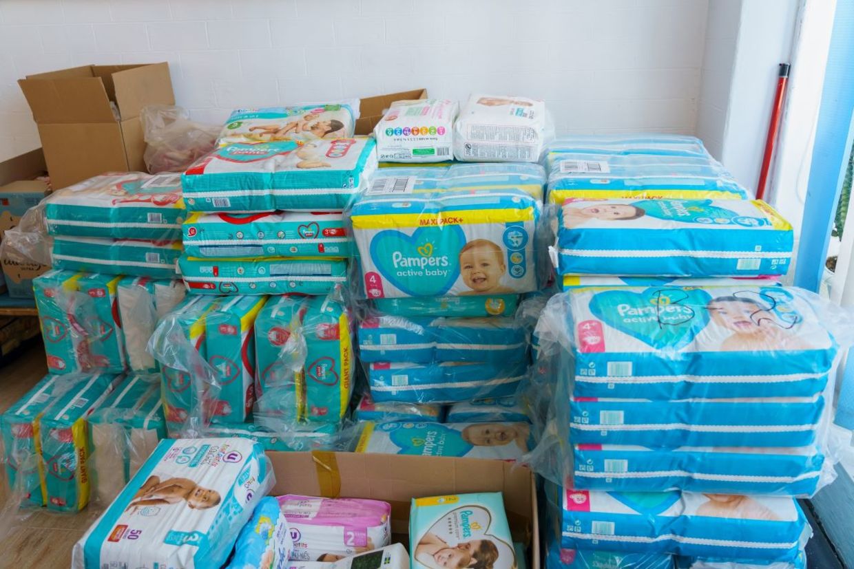 Collecting diapers for refugees. Collecting diapers for refugees.