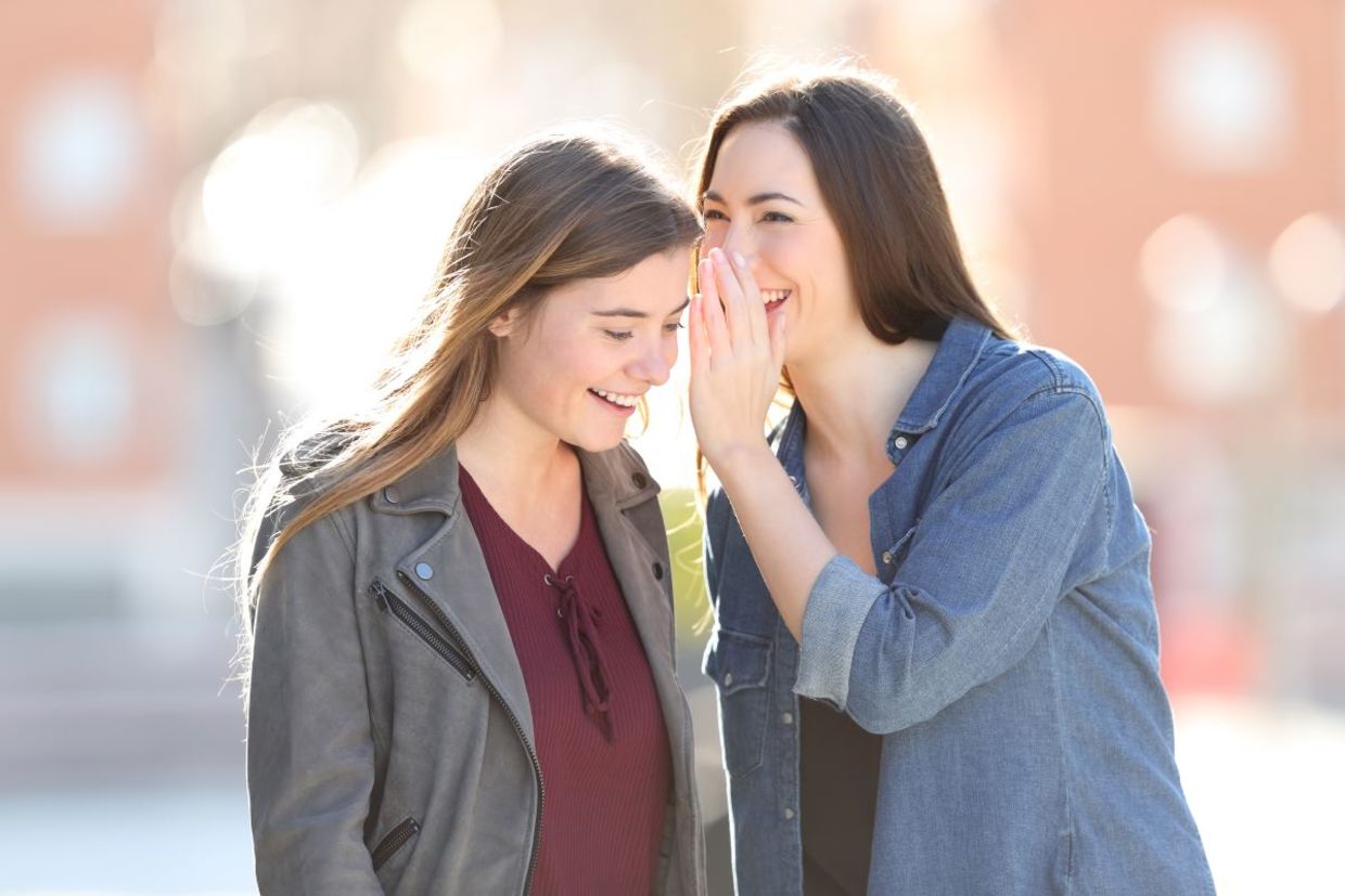 Two friends sharing good news. Two friends sharing good news.