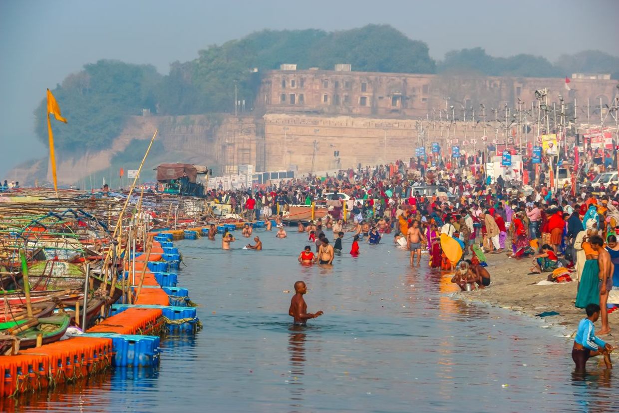 Devotees at the Kumbh Mela festival. Devotees at the Kumbh Mela festival.